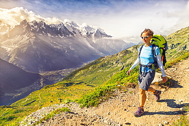 Roberta walks over Chamonix during the Tour of the Mont Blanc