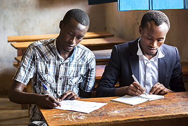 Students work on applications to a university at the Kiziba Refugee Camp in Kibuye, Rwanda.