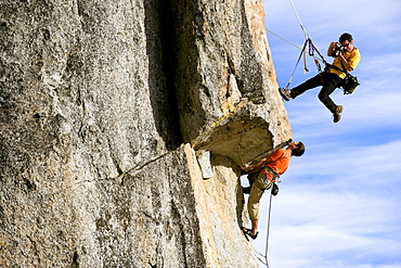 Corey Rich photographs Mitch Underhill during a climb on Lower Phantom Spire, South Lake Tahoe, CA, United States of America