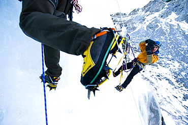 Corey Rich photographs Zach Fletcher while ice climbing in Lee Vining, CA, United States of America