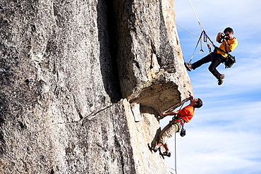 Corey Rich photographs Mitch Underhill on a climb on Lower Phantom Spire, South Lake Tahoe, CA, United States of America