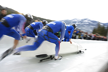 Whistler, BC, CANADA; A four man bobsleigh races at the at the Whistler Sliding Center as crowds look on, CANADA