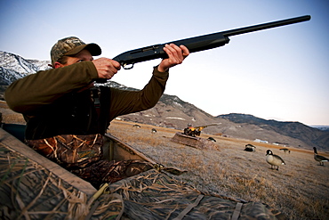 Brad Jackson and Corey Funk hunt geese from blinds in Carson City, NV, United States of America