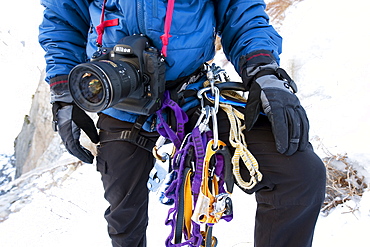 Corey Rich prepares his gear to photograph Zach Fletcher ice climbing in Lee Vining, CA, United States of America