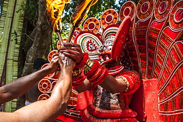 Theyyam ritual performed in the area of Kannur, Kerala, India.