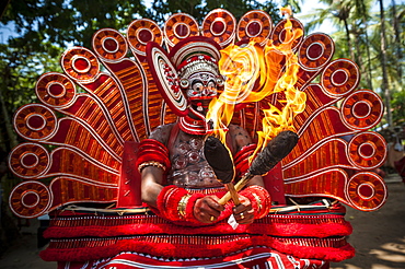 Theyyam ritual performed in the area of Kannur, Kerala, India.