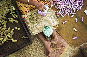 A woman working in a cigarette (bidi or biri) factory near Kannur, Kerala, India.