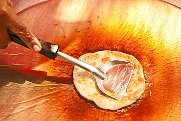 Traditional Thai pancake "Roti" in the making at a street vendor in Bangkok