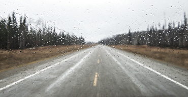 Driving the Alaska Highway on a rainy day.