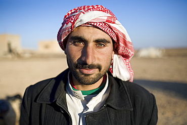 Portrait of a young Syrian Bedouin man in Palmyra, Syria.