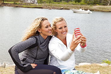 Two girls taking selfies