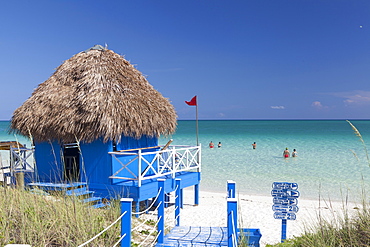 People swimming in turquoise water in Playa Pilar, one of the most famous and beautiful beach in Cayo GUillermo, Cuba