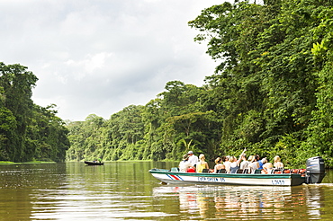 Tourists exploring the canals of Tortugaro National Park by boat, Costa Rica