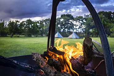 A campfire in a meadow in the Utah Mountains