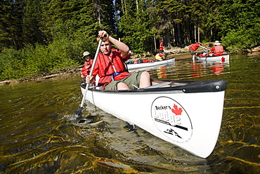 Boy Scouts canoeing on the Bowron Lakes circuit. Bowron Lakes Provincial Park. Quesnel, British Columbia