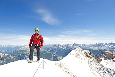 Man Climbing At The Via Ferrata Ivano Dibona In Dolomites, Italy