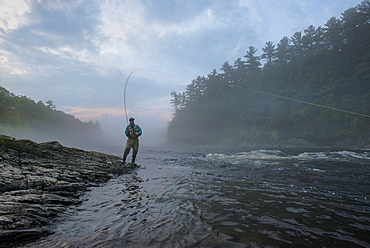 Fly Fisherman Fishing At Kennebec River, Maine