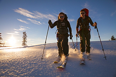 Two People Ski Touring Through Fresh Snow In Garibaldi Provincial Park, Canada