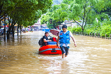 Rescue Workers During The Floods In Yangshuo