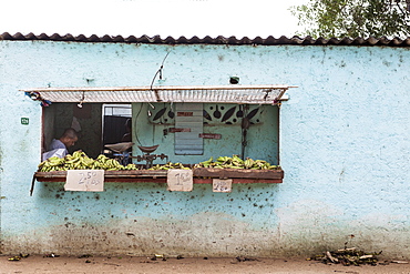 Vendor Sitting In Stall In The Fruit Market In Camaguey, Cuba