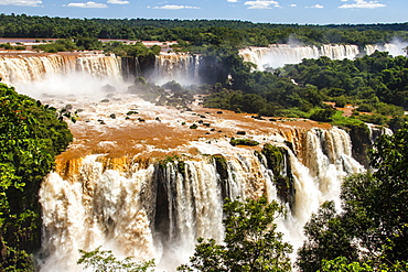 High Angle View Of Muddy Reddish Brown Waters Of Iguazu Falls