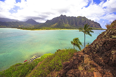 A Kayak Sitting On The Shore Of Mokolii In Oahu, Hawaii