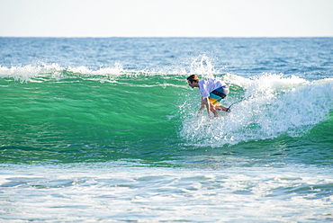 Man Surfing On Waves At Baja California Sur, Mexico