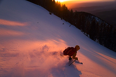 Brody Leven Skiing Down La Sal Mountains During Sunset In Utah