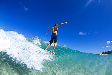 Lucas Dirske Bodysurfing At Pupukea Sandbar On The North Shore Of Oahu