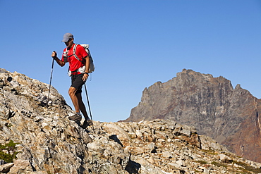 Male Hiker Exploring The Rocky Terrain Of The North Cascades National Park, Washington, Usa