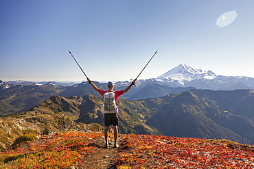 Backpacker Exploring Mount Baker While Hiking In North Cascades National Park