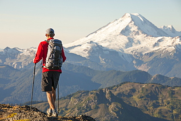 Man Hiking In North Cascades National Park With View Of Mount Baker