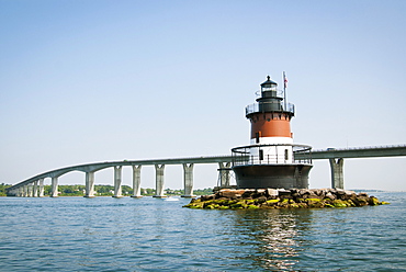 Plum Beach Lighthouse in front of the Jamestown Bridge, Rhode Island