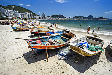 Fishing boats in the sands of Copacabana Beach, Rio de Janeiro, Brazil