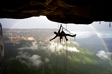 JeanLouis Wertz on ropes in Apichavai 8a+. Venezuela expedition "jungle jamming" to Amuri tepuy and Tuyuren waterfalls, with Nicolas Favresse, Sean Villanueva, Stephane Hanssens and Jean louis Wertz. The team free climb to new climbingroutes on the Tepuy, which is 3 days of walk to the village of Yunek near Santa helena and the salto angel(canaima).