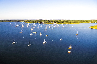 Aerial drone view of boats at anchor and moorings in Dutch Harbor of Narragansett Bay, Rhode Island (Drone)