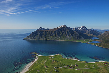 View over beaches and village of Flakstad from Flakstadtind mountain peak, Flakstadøy, Lofoten Islands, Norway