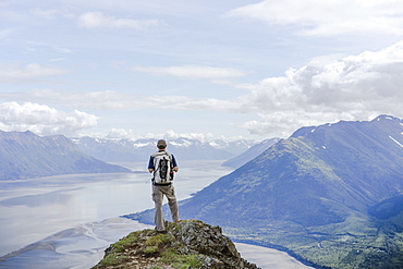 Make hiker at Hope Point in Chugach National Forest Alaska overlooking Turnagain Arm