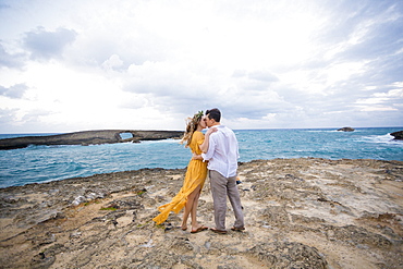 Engaged couple portrait on the beach at North Shore Oahu Hawaii in the Spring.