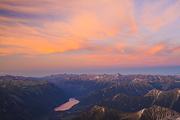 Alpenglow over Duffey Lake and Duffey Lake Road as seen from the summit of Joffre Peak.