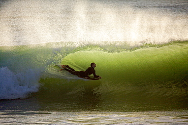 The regularity and beauty of the waves at Le Loch beach have made this a hot spot for surfers. Le Loch, Guidel, Brittany.