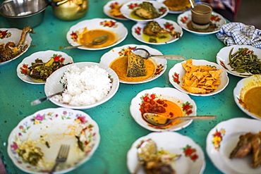 Traditional food, padang, at a restaurant in Kerinci Valley, Indonesia.