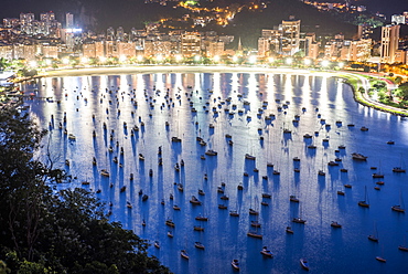 View from Sugar Loaf Mountain during dusk to Botafogo Beach in Rio de Janeiro, Brazil