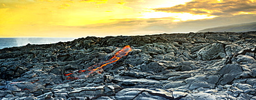 Fresh lava breaking through at the Kalapana lava flows, on the big island of Hawaii.