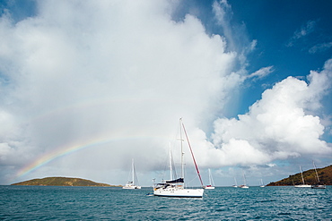 Rainbow over a sail boat in Prickly Pear Island, British Virgin Islands