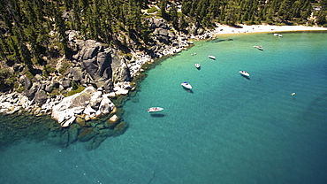 Photograph with aerial view of boats near shore of Lake Tahoe, California, USA