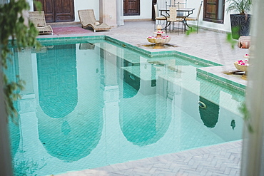 Photograph of empty swimming pool in Moroccan riad, Marrakech, Morocco