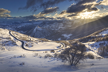 Scenic view of winter scenery with road and mountains, San Glorio, Liebana, Cantabria, Spain