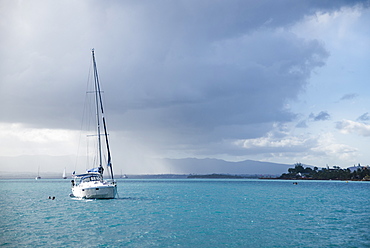 View of single sailboat anchored in sea, Gosier, Guadeloupe