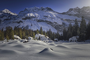 Majestic natural scenery with snow covered mountains in winter, Switzerland